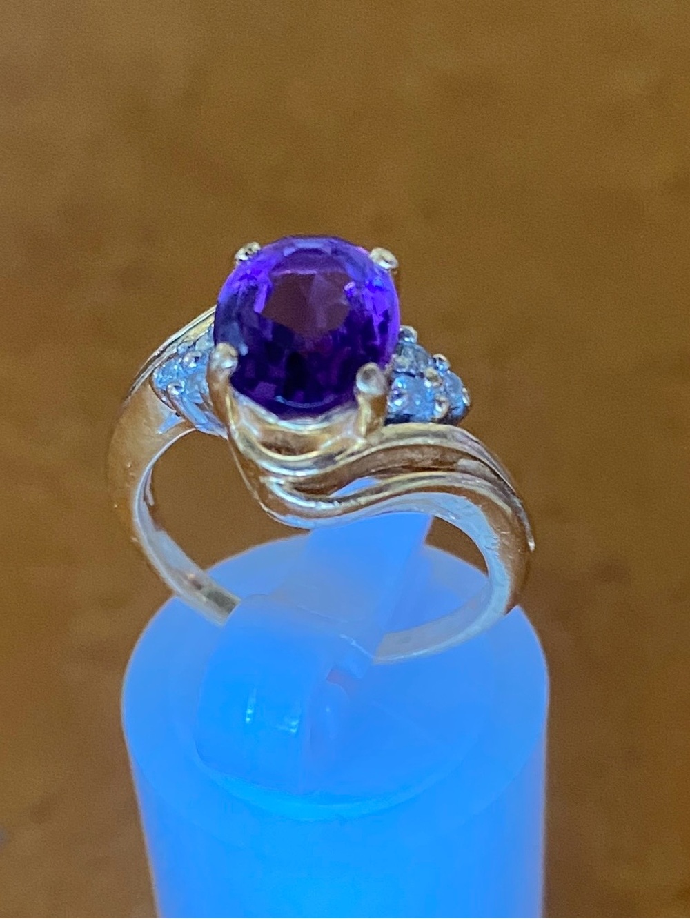 Gold Ring with Amethyst Center and Side Accent Stones